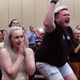 Abortion supporters Alie Utley and Joe Moyer (R) react to the failed constitutional amendment proposal at the Kansas Constitutional Freedom Primary Election Watch Party in Overland Park, Kansas on August 2, 2022.